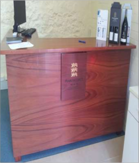 Photo of a desk showing the gilded panel